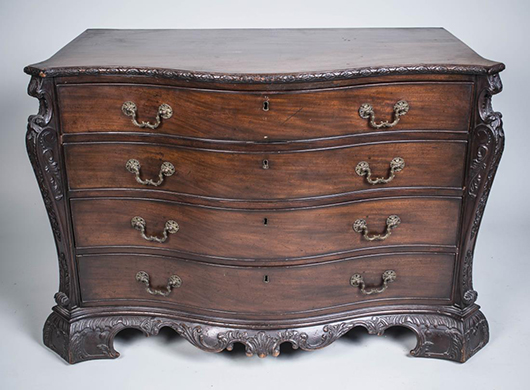 Chippendale-style mahogany chest of drawers, with a serpentine-fronted top over four drawers. Sold for $10,800. Capo Auction image